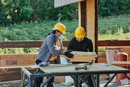 Construction workers discussing plans.
